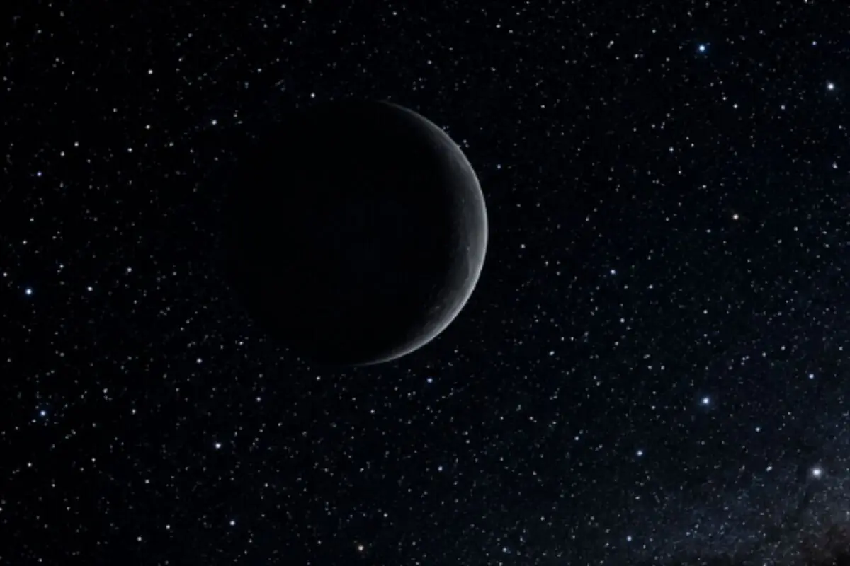 Luna en fase creciente iluminada tenuemente sobre un cielo oscuro lleno de estrellas. Luna en fase creciente iluminada tenuemente sobre un cielo oscuro lleno de estrellas.